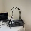 Bolso de hombro PU a cuadros estilo coreano, nuevo modelo primavera 2026, bolso simple para el día a día, bolso de hombro elegante y versátil con alto atractivo estético