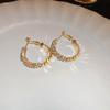 Pendientes de anillo liso transfronterizos europeos y americanos con aguja de plata, pendientes de nicho de viento frío, pendientes de temperamento de moda, lujo ligero, sentido de alta gama