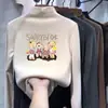 Nueva camiseta versátil de manga larga estilo coreano para otoño e invierno para niños, con cuello alto cálido y hecha de un tejido suave y cómodo