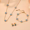 Colgante de Acero Inoxidable Múltiples Flores Pequeñas Doble Cara, Joyería Casual y Compacta, Set de Flores de Cuatro Hojas de Acero de Titanio de Venta Caliente Transfronteriza para Mujeres
