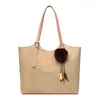 Bolso de mujer retro de color liso muy vendido, modelo nuevo 2026, bolso de hombro de alta gama, bolso tote de gran capacidad, bolso de moda para el día a día