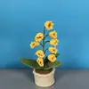 Planta de lirio de los valles tejida a mano terminada en maceta, decoración de coche, flor artificial eterna, regalo para profesor o novia, flor tejida