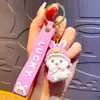Liquidación de colección de llaveros colgantes de personajes de dibujos animados IP auténticos, lindos colgantes de estrella-luna-conejo para bolsos de niñas, stock para vendedores ambulantes