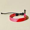 Nueva pulsera tejida con patrón de bandera multinacional de tela casual europea y americana de venta caliente transfronteriza, pulsera de moda callejera para hombres y mujeres