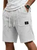 2026 Nuevos Shorts de Playa Estilo Europeo y Americano para Hombre, Corte Holgado con Cordón Elástico, Pantalones Cortos de Cinco Puntos con Etiqueta y Múltiples Bolsillos