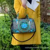 Estilo étnico bordado portátil bandolera doble uso bolsa tambor lona bordada bolsa floral viaje hombro portátil bolsa para mujer