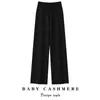 Pantalones de punto casuales de cachemira 100% pura de cintura alta y pierna ancha para mujer, con cordón, corte holgado y una silueta favorecedora y estilizada.