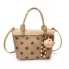 Bolso tipo cubo casual estilo coreano, nuevo bolso de mano otoño e invierno 2026, bolso de hombro y cruzado de moda con lunares único