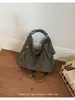 Bolsa feminina transfronteiriça 2026 início da primavera nova versátil vintage cor sólida camurça grande capacidade bolsa de ombro bolsa tiracolo