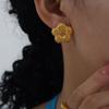 Aretes al por mayor caen en el patrón mundial textura de girasol aretes de acero de titanio mini aretes pequeños exquisitos