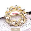 Versión coreana de hebilla de toalla de seda multifuncional al por mayor hebilla de ropa de alto nivel accesorios decorativos de pedrería de perlas hebilla de nudo de esquina