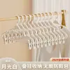 Herramienta de almacenamiento para perchas para uso doméstico, pinzas para pantalones al por mayor, pinzas para faldas JK, antideslizantes y sin marcas, perchas de plástico multifuncionales mejoradas para pantalones