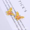 Pendientes de aleación con forma de mariposa con forma de gota de aceite y diamantes, llaveros colgantes, hechos a mano, venta al por mayor.