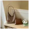 Bolsa de Palha Trançada Francesa 2026 Nova Moda Comute Praia Bolsa Tote Listras Trançadas Férias Bolsa de Ombro Trançada Feminina