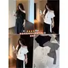 Camiseta Feminina Ruoxin Estilo High-End com Cadarço para Ajuste na Cintura, Emagrecedora, Manga Curta, Design Único com Cadarço, Novidade para o Verão 2026
