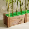 Instalações comerciais de bambu artificial, de 1,2m a 4,5m em vários tamanhos, adequadas para uso interno e externo em shoppings e showrooms.