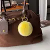Llavero de piel sintética de conejo tenis transfronterizo superventas modelo explosivo felpa artículos deportivos periféricos de raqueta muñeca creativa evento