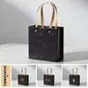 Bolsa de Papel para Bolso Bolsa de Regalo para Té Bolsa de Papel Kraft para Bolso Bolsa de Regalo para Vino Especial Ropa Se Puede Personalizar