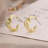 Europa y Estados Unidos venta caliente pendientes de perla geométricos asimétricos espiral diamante cadena hueca personalidad moda pendientes de perla