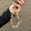 Cadena para teléfono móvil con cuentas de estrella llavero lazo colgante para funda de teléfono móvil adornos cadena de mano para bolso de niña venta al por mayor