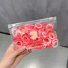 100 Elásticos de Cabelo de Crisântemo Pequenos Amassados, Elásticos Coloridos Simples Embalados para Crianças, Anéis de Toalha, Elásticos de Cabelo de Polegar Modernos