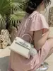 Bolsa Pequena Transfronteiriça com Padrão de Pedra para Mulheres 2026 Nova Moda Estilo Simples Casual Bolsa de Ombro Versátil Bolsa Transversal