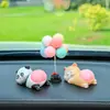 Adornos para coche en línea rojo caricatura lindo Q juego trasero muñeca consola central del coche juguete de descompresión decoraciones de animales