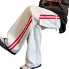 Calça de moletom reta com listras transversais, nova marca da moda primavera/verão estilo folgado preguiçoso calças casuais para casal vestuário masculino