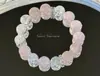 Pulsera bicolor de cristal azul natural y cristal rosa con diseño de oso y rosa, una pulsera blanca de lujo ligero y estilo antiguo fresco.