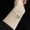 Pulseira Popular Japonesa e Coreana de Aço Titânio com Anel Duplo Romano para Meninas, Luxo Acessível e Pulseira Banhada a Ouro 18K de Alta Qualidade que Não Desbota