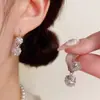 Moda Nueva Estilo Francés Exquisitos y Lujosos Brazaletes para Oreja de Bola de Circonita Ultra Brillante con Borla, Pendientes Únicos y de Alta Gama