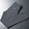 Pantalones elásticos de cintura alta para hombre, de pierna recta holgada, sin arrugas, estilo business casual, nuevos pantalones largos fluidos de primavera-verano