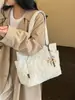 Moda de Invierno Casual Bordado de Estrellas Bolsa de Tela de Gran Capacidad para Mujer 2026 Nueva Bolso Tote Hombro Color Sólido Texturizado