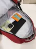 Mochila de viaje versátil estilo coreano para parejas con bordado de letras, mochila escolar elegante y duradera para chicos de secundaria y preparatoria