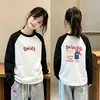 Camiseta térmica de manga larga con estampado de dibujos animados para niños, cálida y cómoda, top casual versátil para niñas, adecuado para otoño e invierno