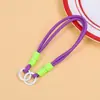 Colgante de juguete de peluche con cordón tejido multicolor, correa de muñeca para teléfono móvil, correa corta de mano con doble hebilla, accesorio de cordón de nailon