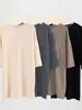 Suéter feminino de tricô casual, com caimento solto e que valoriza a silhueta, de mangas de três quartos, bordas dobradas, gola redonda, comprimento médio, finamente tricotado em fio Yangzi, fino