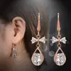 Hebilla de oreja de circonita de venta caliente transfronteriza pendientes largos de lazo para mujer pendientes simples de moda pendientes colgantes fabricantes