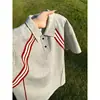 Camiseta tipo polo de manga corta a rayas con bloques de color transfronterizos para hombre, nueva de verano, camiseta de empalme deconstruido con solapa, corte limpio, manga corta