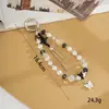 Nuevo colgante de manzana y mariposa con cuentas hecho a mano para teléfono, con un toque de alta gama, charm de cadena doble para bolso, cadena para colgar el teléfono, regalo