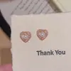 Aretes de Perla en Forma de Corazón con un Toque de Lujo Ligero y Gama Alta, Aretes Dulces y Delicados con Agujas de Plata S925, Exudando una Vibración Elegante y Sofisticada