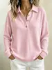 Ropa de mujer europea y americana transfronteriza: Venta al por mayor en Amazon de polos de color liso, tejido gofrado, corte holgado y manga larga con cuello de botones
