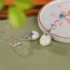 Pendientes de plata de ley S925 con forma de flor de jade hetiano y gota de agua, estilo nacional, joyería hanfu, elegantes y con temperamento.