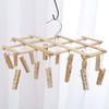 Estante multifuncional plegable de bambú para calcetines, tendedero doméstico de múltiples cabezas, pinza para ropa de pantalón a prueba de viento, perchador de extracción, dos yuanes al por mayor