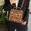 Mochila Retro Popular Bolsa Estampa de Leopardo Outono Nova Bolsa de Ombro Duplo Feminina 2026 Faculdade Deslocamento Estilo Simples Fashion Nicho