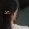 Grampo de madeira de pêssego em forma de U placa dupla de grampo cabeça de bola de cabelo treme com rede vermelha simples moderno grampo de sândalo uma geração de cabelo