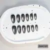 24 PIEZAS Colección de Arte para Uñas Bestseller Transfronterizo Navidad Halloween Flor Uñas Portátiles Ojo de Gato Halloween Piezas de Uñas Portátiles
