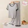 2026 Nuevo Modelo 8 Colores Color Sólido con Copas Acolchadas Dulce Casual Manga Corta Shorts Conjunto de Pijama de Verano para Mujer Ropa de Casa