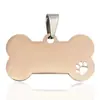 Etiquetas de Acero Inoxidable para Mascotas Transfronterizas, Logos para Mascotas, Colgantes de Etiqueta para Perros Huecos Grabados con Forma de Pata de Perro Hueso, Venta al por Mayor