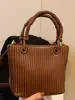 Bolso Cubo Retro de Moda Estilo Francés para Mujer 2025 Otoño Textura Simple Bolso de Hombro Bolso Cruzado de Moda para Mujer